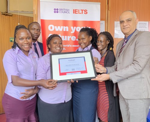 Receiving our partnership certificate from the British Council.